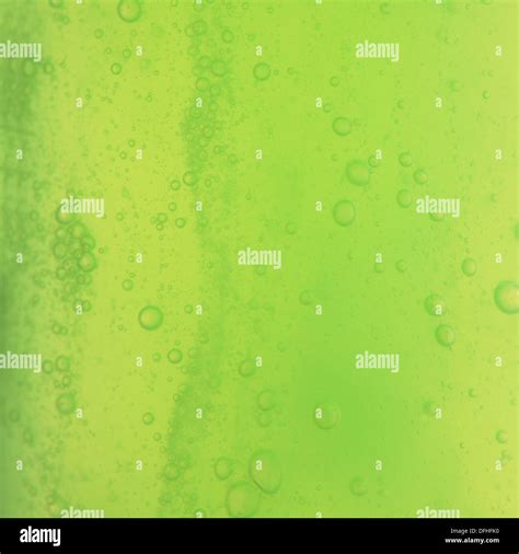 Green Abstract Blurred Liquid Background With Soap Bubbles Square