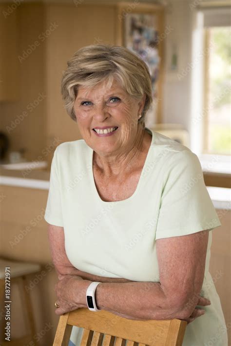 Beautiful Portrait Of Pretty And Sweet Senior Mature Woman In Middle Age Around 70 Years Old