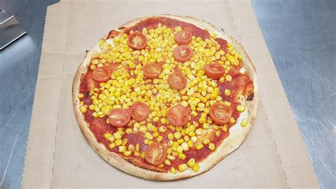 Someone Just Ordered This Pizza No Cheese Just A Layer Of Tomato
