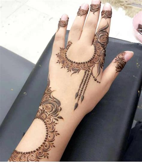 Image May Contain One Or More People And Closeup Henna Hand Designs