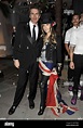 John Taylor and Gela Nash-Taylor attending the launch party for Juicy ...