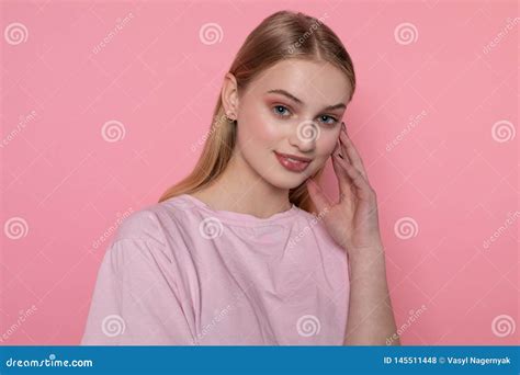 Good Looking Young Blonde Student With Blue Eyes Smile Positive After