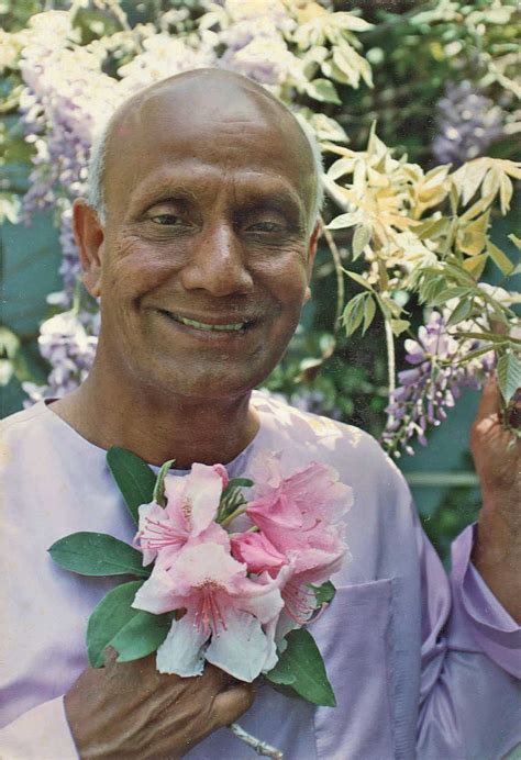 Smiling With Flowers SRI CHINMOY PHOTOS