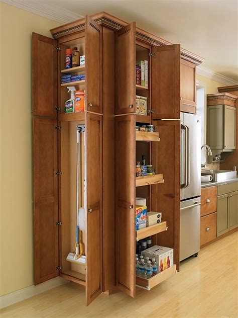 This is especially true for people whose kitchens don't have a pantry area. Organizer cabinet. Especially like the tall space to ...