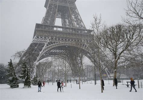Eiffel Tower Shuts Down As Snow Freezing Rain Pummel France The