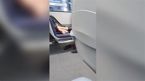 Disgusting Rail Passenger Kicks Off Her Shoes And Rests Her Bare Feet On The Seat On London