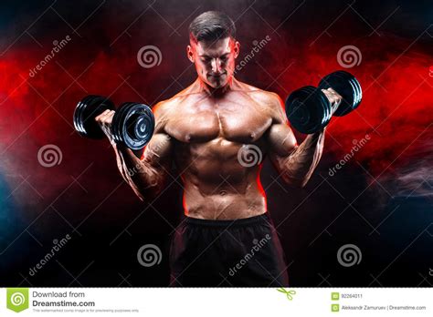 Concentrated Muscular Man Doing Exercise With Dumbbell Stock Image Image Of Fitness Naked