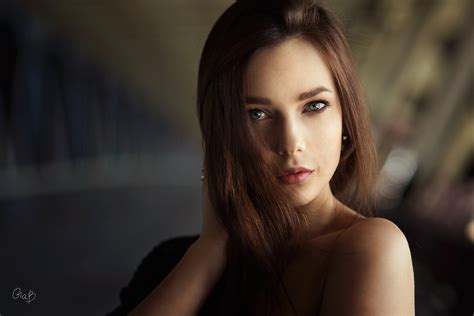 'not just dark skin and blue eyes, because you can get that combination, but also the face shape. Women, Auburn Hair, Blue Eyes, Face, Depth of Field ...
