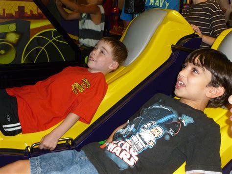 131 Asher And Borna On A Ride At Chuck E Cheese Stacy Laughlin