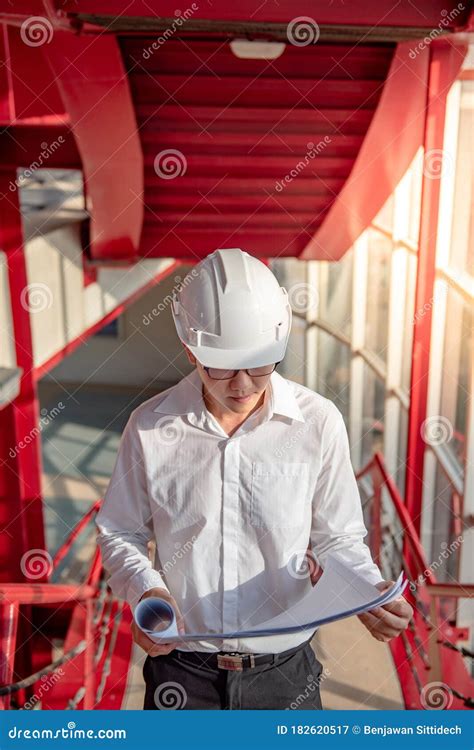 Asian Civil Engineer Man Working At Construction Site Stock Image
