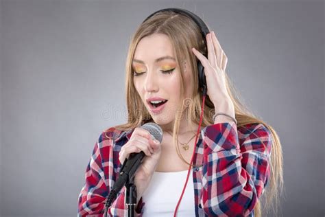 Woman With Headphones And Microphone Singing Stock Photo Image Of