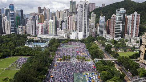 Huge Crowds Turn Out For Pro Democracy March In Hong Kong Defying