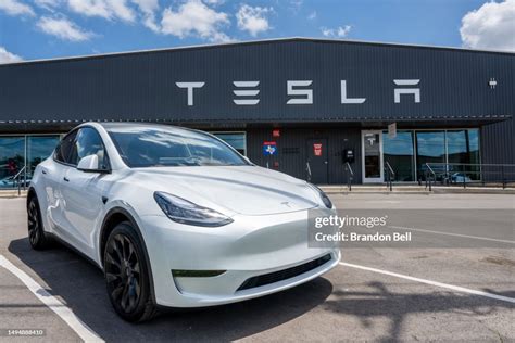 A Tesla Model Y Is Seen On A Tesla Car Lot On May 31 2023 In Austin