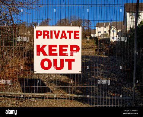A Private Keep Out Sign On A Wire Fence Stock Photo Alamy