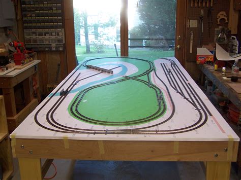 The controls are easy and intuitive—one large remote—that allows you to drive the train forwards or backwards and feature whistle sounds, chugging and passenger announcements. Chapter Model railroad layout design ~ Bistrain