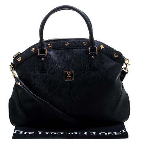 Mcm Black Leather Handbag Lyst