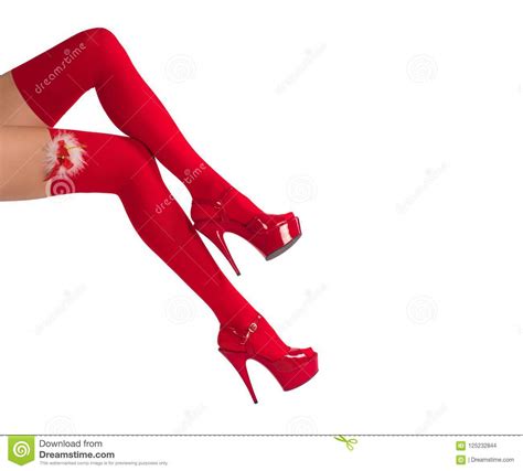 Female Legs In Fetish Red Stockings And Red High Heels Isolated On