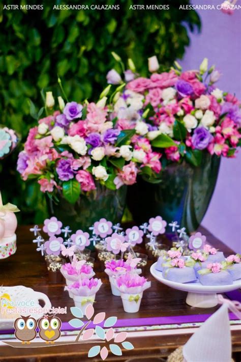 This gorgeous garden themed 1st birthday party features tons of beautiful flowers, a stunning birthday cake with cascading flowers, desserts with flower accents, and pink and gold party decor. Kara's Party Ideas Fairy Garden Themed 1st Birthday Party | Kara's Party Ideas