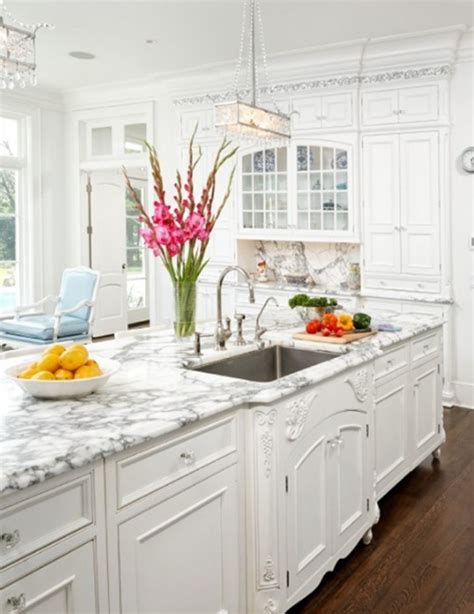 A light wood floor and white subway tile backsplash will help brighten the room while allowing gray cabinets to become the centerpiece of the design. beautiful-white-kitchen-design-ideas | HomeMydesign