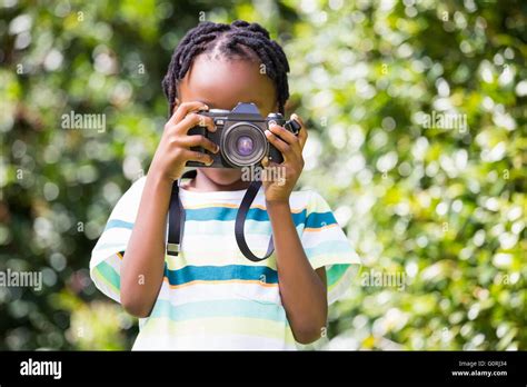 A Child Is Taking Pictures Stock Photo Alamy