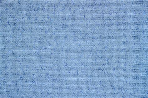 Light Blue Canvas Fabric Background With Visible Texture Pattern For