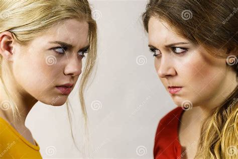 Angry Girls Looking At Each Other Stock Photo Image Of Emotion Hate