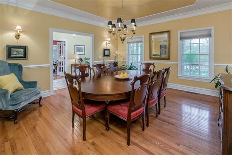 Will you break the chair rail for windows, or position the chair rail below the windows? The dining room features two large windows, a chair rail ...