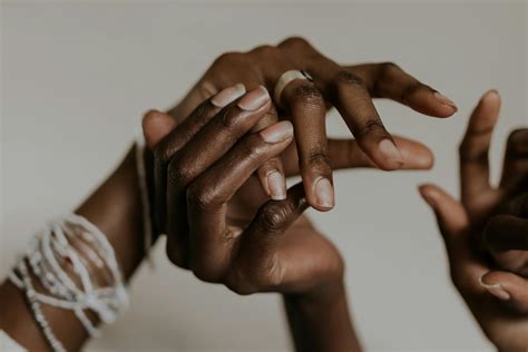 Black Women Holding And Touching Hands · Free Stock Photo
