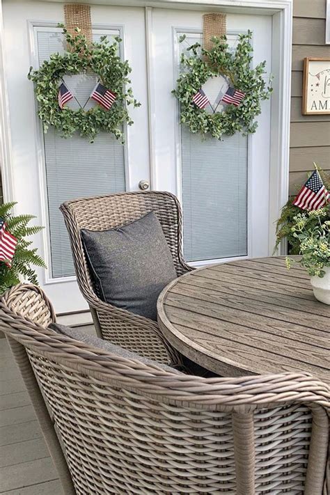 The glossy hardwood table is flanked by a set of creamy orange chairs with button tufted upholstery. Better Homes and Gardens Victoria Outdoor Dining Patio Set ...