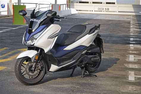 The importance of your first oil change 2019 Honda Forza 300 Review: Personal Car-Lite - CarBuyer ...