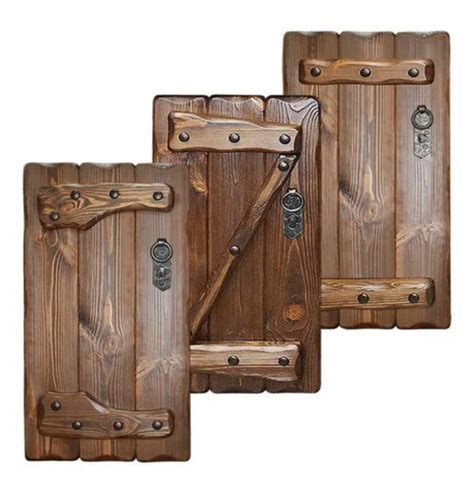 Three Wooden Doors With Metal Handles On Them
