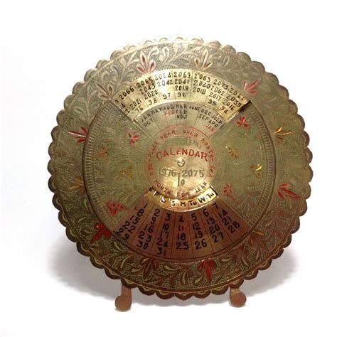 Vtg 100 Year Calendar Rotating Perpetual Brass Ornate Embossed Disk On