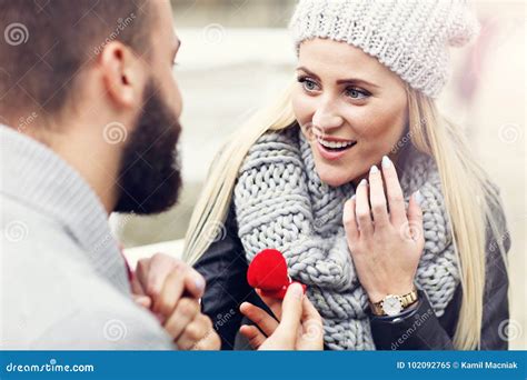 Adult Man Giving Engagement Ring To Beautiful Woman Stock Image Image Of Fiance Diamond