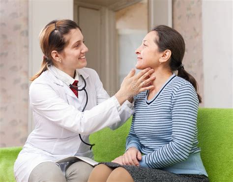 Doctor Touching Neck Of Patient Stock Photo Image Of Illness
