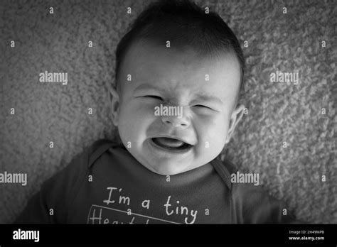 Baby Born Screaming Black And White Stock Photos And Images Alamy