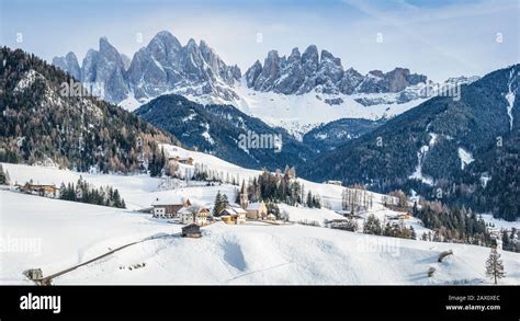 Classic View Of Famous Dolomites Mountain Peaks With The Village Val Di