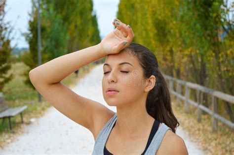 runner woman tired after running in the park stock image image of happy jogger 98982881