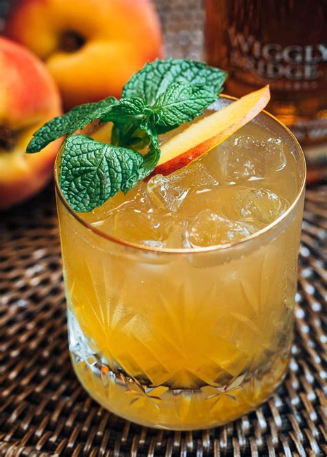 The holidays call for cocktails! Bourbon Peach Smash | Recipe | Brunch drinks, Brown sugar ...