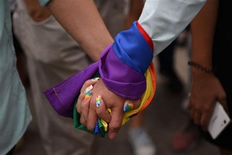 hong kong s top court grants british lesbian right to spousal visa in landmark ruling the