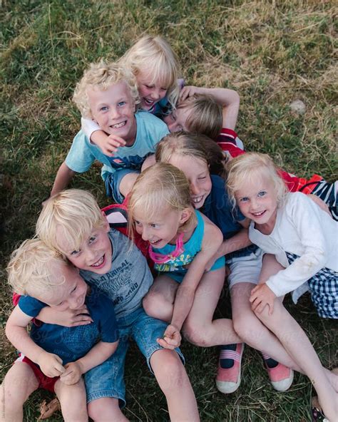 Download kids best friend images and photos. stock photo of #Group Of Blonde #Kids Hugging | Stocksy ...