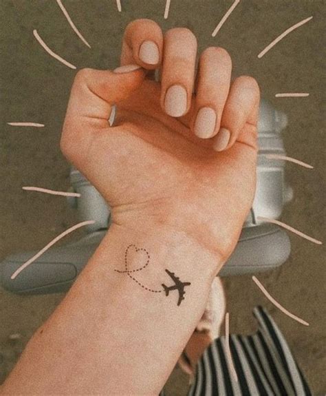 50 Gorgeous Small Wrist Tattoos To Try In 2019 Airplane Tattoos