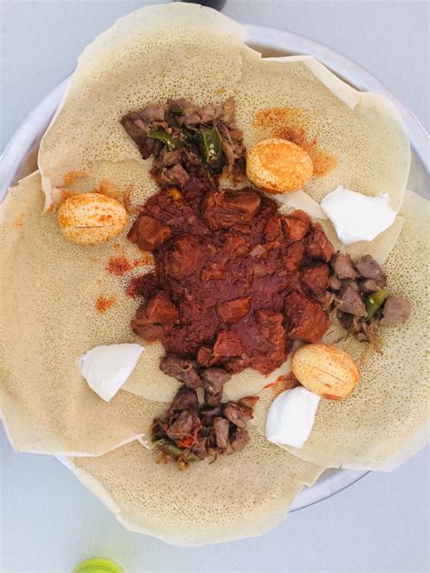 Découvrez notre recette de doro wot, un plat éthiopien au poulet. Adama - Traiteur indien & éthiopien