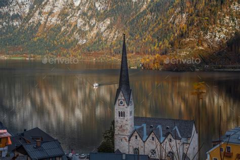 Ferry Boat On Lake Hallstatt And Hallstatt Evangelical Church