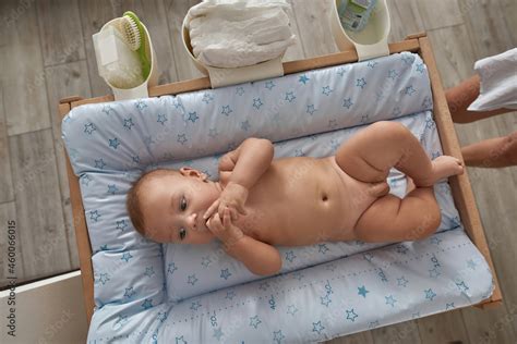 Naked Baby Boy On Nursery Pad Top View Stock Foto Adobe Stock