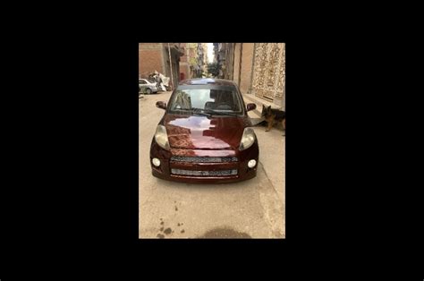 SIRION Daihatsu 2009 Mansoura Dark Red 6146309 Car For Sale Hatla2ee