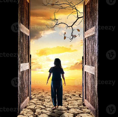 Composite Of Woman Walking Through Open Doors Into Sunset 2224118 Stock
