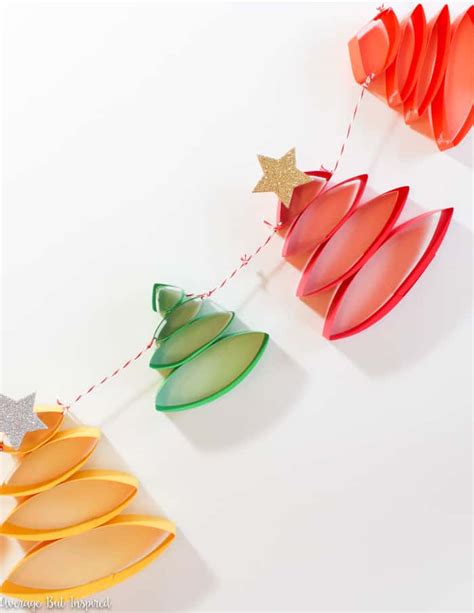 How To Make The Cutest Paper Christmas Tree Garland Average But Inspired