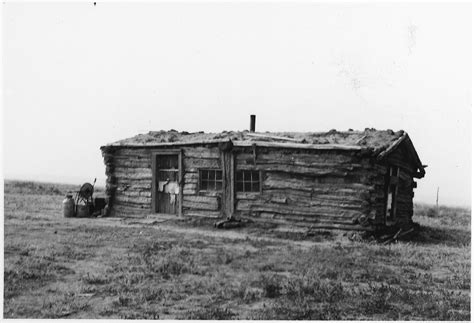 Log Cabin And Sod House In Pella Iowa