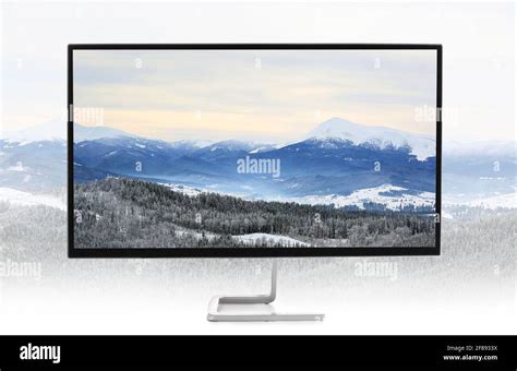 Beautiful Landscape With Snowy Mountains On Screen Of Modern Tv Set
