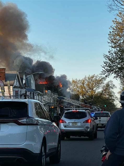 BREAKING: Ferocious Fire Engulfs Newark Home, Firefighters Battle to